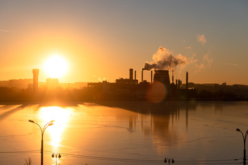 Type of industrial pipes from which smoke. Industrial waste pollutes the atmosphere of the earth