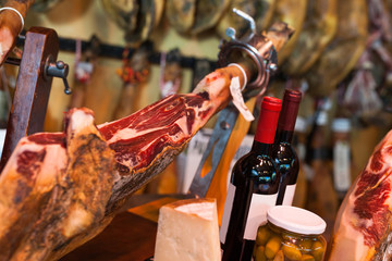 jerked iberic jammon of bacon with wine, cheese and olives