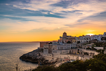 a view of Santa Cesarea Terme at sunset, with its splendid Arab and Moorish palaces, Puglia, Salento, Italy. Hydrothermal station in the province of Lecce, between Otranto and Santa Maria di Leuca.