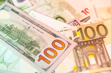Obraz na płótnie Canvas Dollars and euro bills background. Close up cash money.