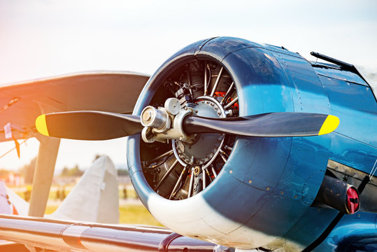 Fragment Propeller With Engine And Retro Airplane Close Up. Screw Plane