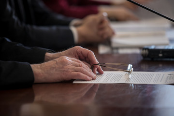 Press conference. Public speaker giving talk to Television camera. News conference. An event with a video camera. press and media in public news coverage event for reporter and mass communication