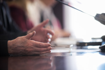 Press conference. Public speaker giving talk to Television camera. News conference. An event with a video camera. press and media in public news coverage event for reporter and mass communication