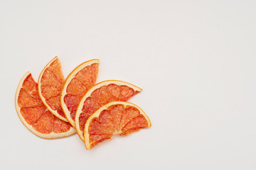 slices of grapefruit isolated on white background