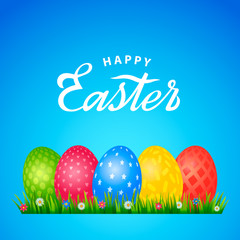 Bright greeting card with handwritten inscription Happy Easter. Retro lettering. A set of Easter eggs with different ornaments on the background of green grass and spring flowers.