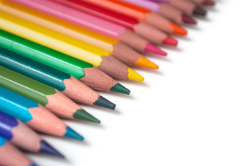 closeup of colouring pencils set on white background