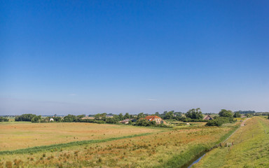 Fototapeta na wymiar Little farm in the landscape of Texel island, Netherlands