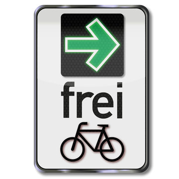 Verkehrsschild mit Gr&uuml;ner Pfeil und Erlaubnis zum Abbiegen f&uuml;r Radfahrer
