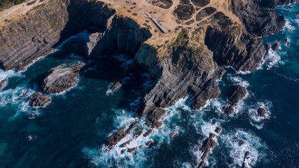 Aerial view of the Cabo Sardao cliffs and Waves Atlantic coast Portugal