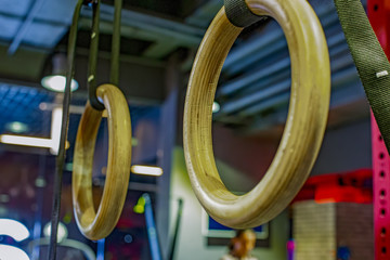 gym rings with defocused background. Gymnastic ring