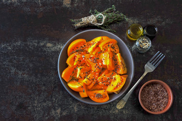 Healthy salad with yellow tomatoes and spices. Bright salad bowl. Vegan healthy salad.