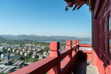 Fototapeta na wymiar Red Attic and Urban Panorama in Hangzhou, China