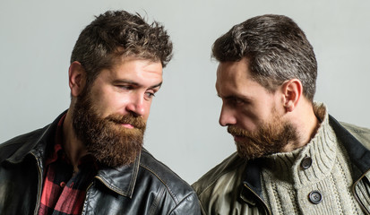 Masculine and brutal friends. Bully team. Masculinity and brutality. Feel confident in brutal leather clothes. Brutal men wear leather jackets. Men brutal bearded hipster. Handsome stylish and cool