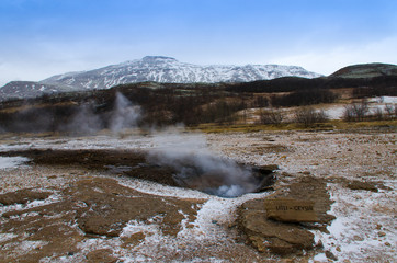 The eruption of the Litli geyser in the southwestern part of Iceland in a geothermal area near the river Hvitau
