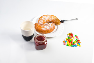 cup of coffee and donuts on white background