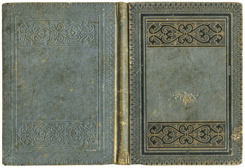 Old open book cover in grey canvas with embossed golden abstract and floral decorations (circa 1880), isolated on white, beautiful details