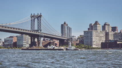 Fototapeta na wymiar Panoramic view of the Manhattan Bridge and Brooklyn, color toned picture, New York, USA.