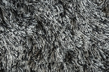 Close-up to abstract gray wool carpet background