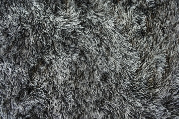Close-up to abstract gray wool carpet background