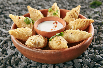 Azerbaijani Fried Dumplings Giurza with Minced lamb Meat also known as Gyoza