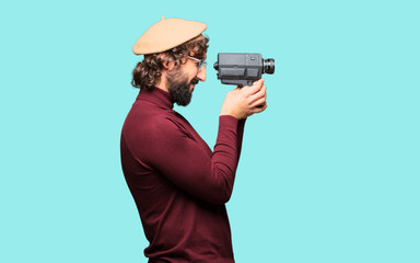 French artist with a beret and vintage movie camera
