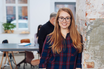 Attractive young redhead businesswoman