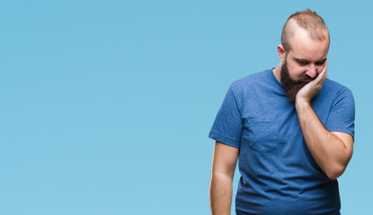 Young caucasian hipster man over isolated background thinking looking tired and bored with depression problems with crossed arms.