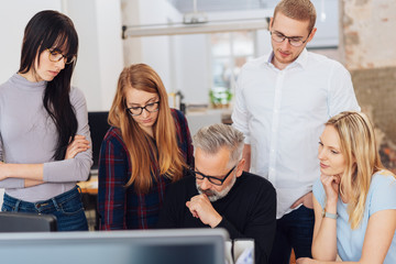 Dedicated business team pondering a problem