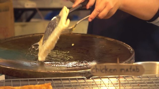 Making  Roti Parantha Roll, street food in Bangkok, Thailand.