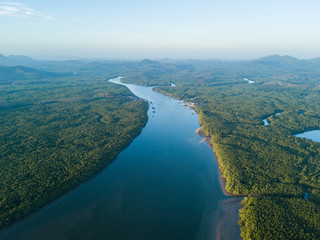 Fototapeta premium aerial view of sunrise at Ban Sam Chong Tai