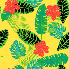 Tropical pattern with hibiscus flowers and leaves. Exotic seamless pattern with tropical leaves. Ethnic Background with Hawaiian flowers and plants.