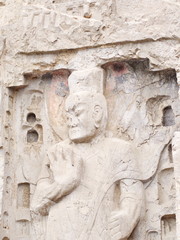Luoyang Longmen grottoes. Buddha and the stone caves and sculptures in the Longmen Grottoes in Luoyang, China. Taken in 14th October 2018