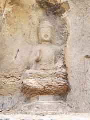 Luoyang Longmen grottoes. Buddha and the stone caves and sculptures in the Longmen Grottoes in Luoyang, China. Taken in 14th October 2018
