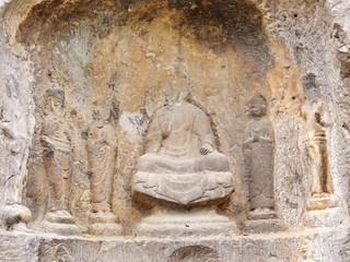 Luoyang Longmen grottoes. Buddha and the stone caves and sculptures in the Longmen Grottoes in Luoyang, China. Taken in 14th October 2018