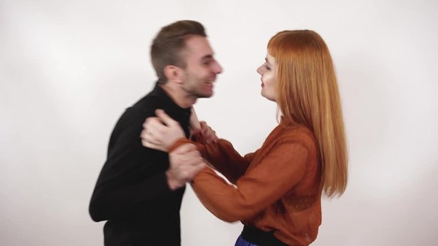 Aggressive man grabbed womans hair and yell at girl, female with long red hair try to protect herself