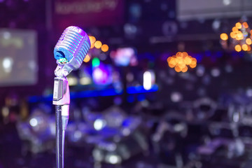 microphone on the nightclub scene. Dark atmosphere in club