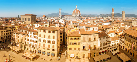 Fototapeta na wymiar Panoramic aerial shot from viewpoint of the classical view to the most famous Florence landmarks at sunny day. Travel in Italy concept