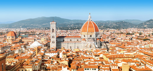 Fototapeta na wymiar Panoramic aerial shot from viewpoint of the classical view to the most famous Florence landmarks at sunny day. Travel in Italy concept