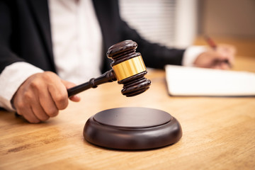 Banker business man shaking hands with client and sign contrac document for comfirm corporation or finished loan agreement for house or building property.Document in photo is fake only for stock photo