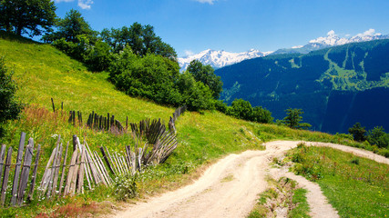 Fototapeta na wymiar Spring Mountain landscape in Georgia with road to Mestia village.
