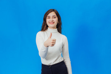 Girl on a blue background. A girl on a blue background with smile