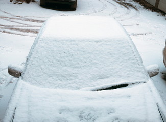 Car windshield closeup in the snow