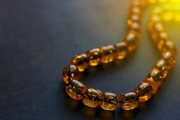 Ramadan Karim greeting background Islamic prayer bead (rosary). Rosary of amber. Ramadan Kareem beautiful poster, banner, postcard for the celebration of the festival of the Muslim community