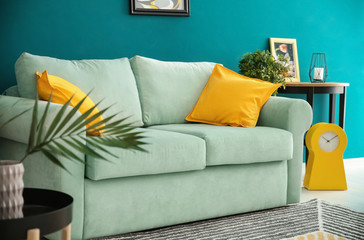 Comfortable sofa in interior of living room