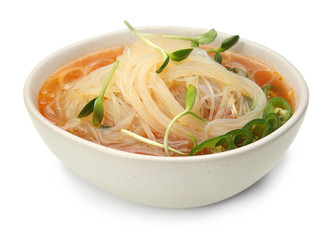 Tasty Chinese soup in bowl on white background