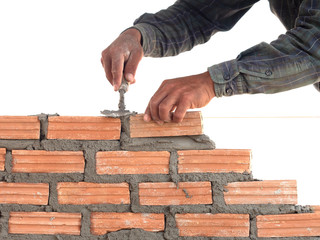 Worker installing bricklaying isolated on white background