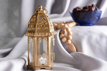 Muslim lantern on light fabric