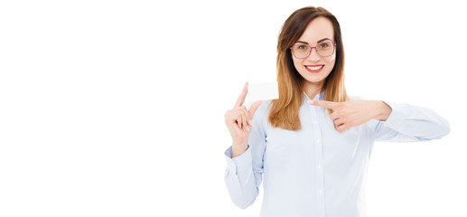 happy girl holding blank card mock up and pointing at it with her hand in isolation