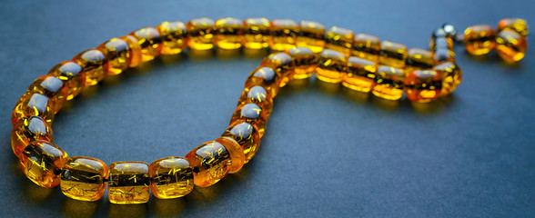 Ramadan Karim greeting background Islamic prayer bead (rosary). Rosary of amber. Ramadan Kareem beautiful poster, banner, postcard for the celebration of the festival of the Muslim community