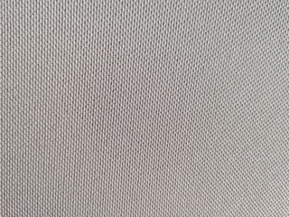 Plakat texture of grey seamless fabric with selective focus. Gray linen natural background. Cloth structure with empty clean surface. Vintage fiber detail.